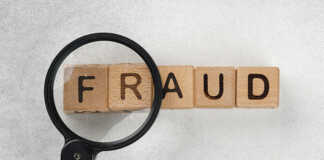 ICW Group's image of a magnifying glass looking at the word fraud.